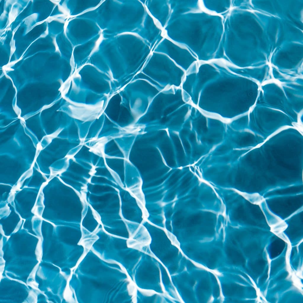 kaboompics Wavy water surface in a swimming pool